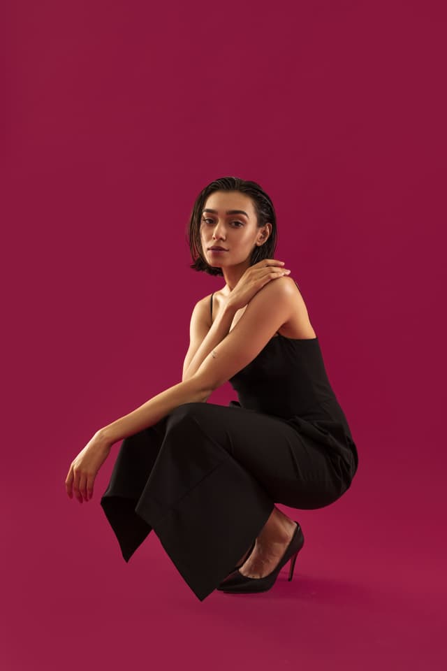 Model wearing dark coat