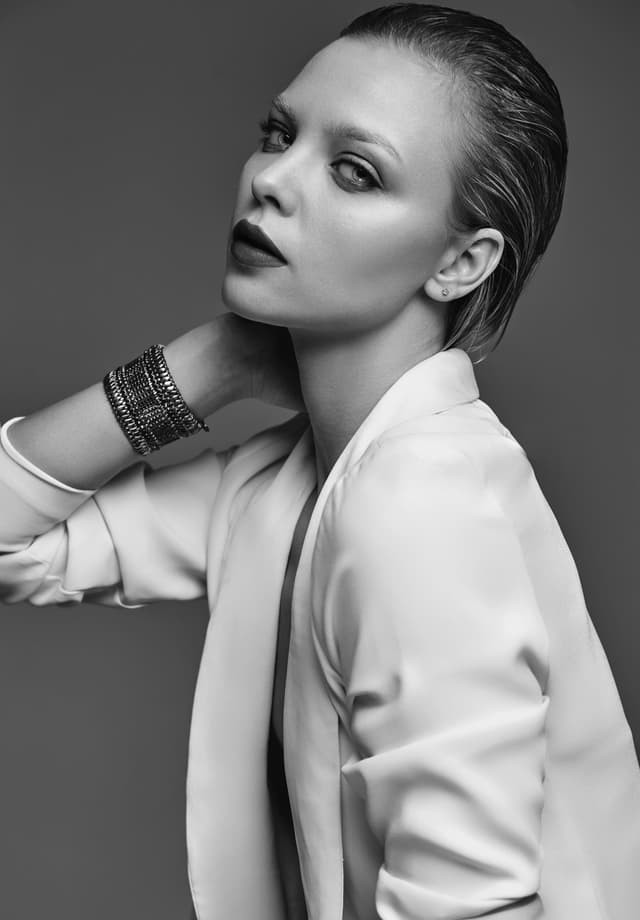 Model in white summer dress